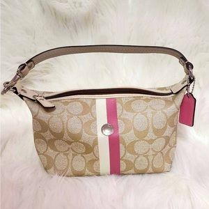 Coach tan purse with white and pink stripe
